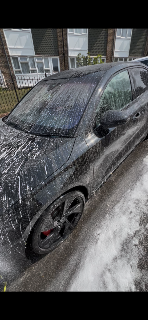 Audi demonstrating hydrophobic beading after a ceramic coating by Elite AutoCare