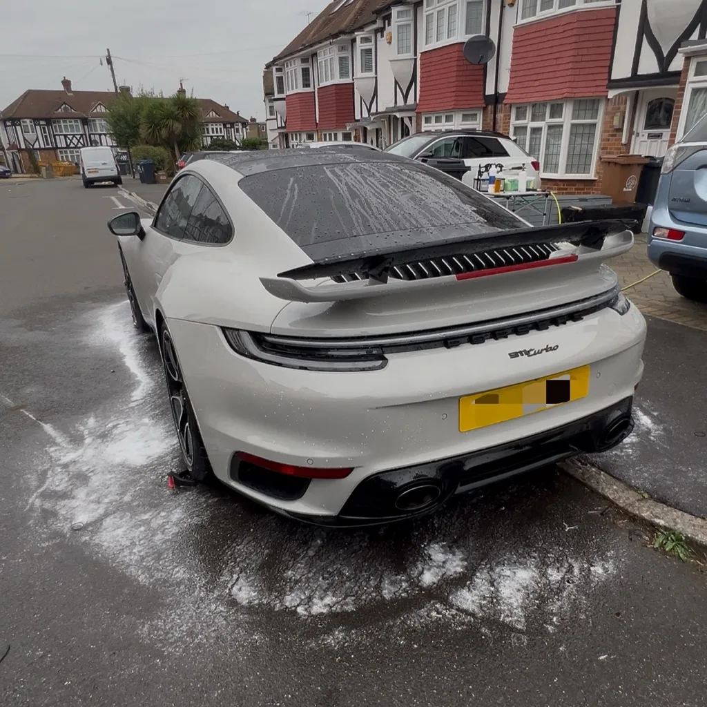 Rear end of a freshly detailed Porsche 911 turbo, done by Elite AutoCare in Croydon